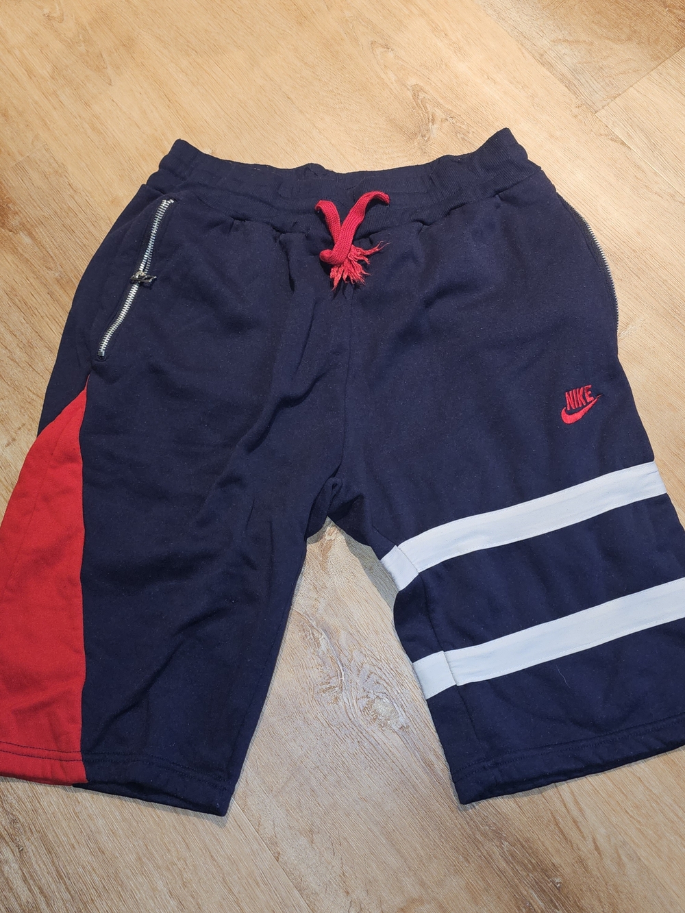 Nike Men's Navy Athletic Shorts with Red Accents